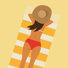 A Girl In A Red Swimsuit And Hat Is Lying On A Towel With Orange Stripes On The Beach And Sand