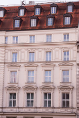 Munich, Germany - December 19 2021: Street view of the facade of the building in Munich downtown on Winter day.