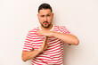© Asier - Young hispanic man isolated on white background showing a timeout gesture.