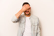 © Asier - Young hispanic man isolated on white background covers eyes with hands, smiles broadly waiting for a surprise.