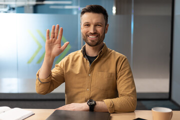 Aufkleber - Businessman Waving Hand To Camera Having Video Call In Office