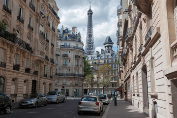 Wall Mural - eiffel tower between buildings in paris