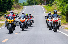 Group Of Bikers Riding On Road In Northern Thailand