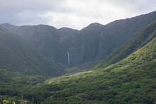 Waterfall Deep In The Lush Halawa Valley On Molokai Island In Hawaii.