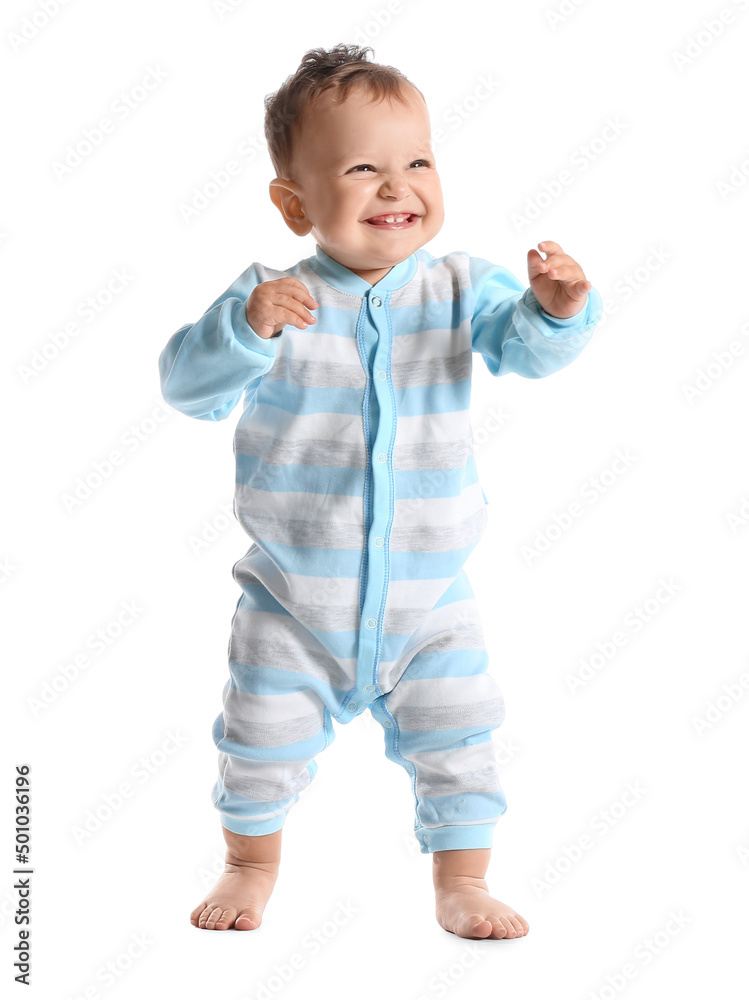Little baby boy learning to walk on white background