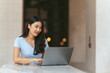 © PaeGAG - Beautiful cute asian young businesswoman in the cafe, using computer laptop.