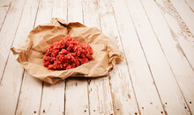 Raw Ground Beef In Parchment Paper