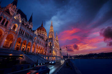 Wall Mural - The Hungarian Parliament Building on the bank of the Danube in Budapest at night time.