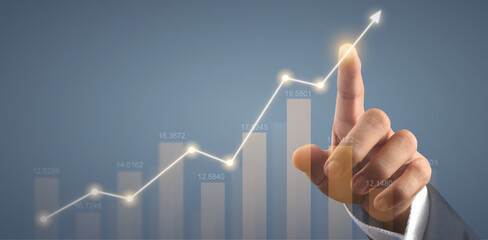 Hand touching  graphs of financial indicator market analysis chart