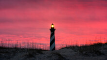 Red Morning Skies Over Cape Hatteras Light House Along The Outer Banks Of North Carolina