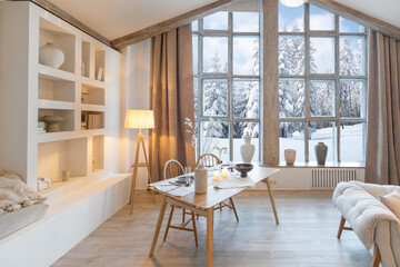 Wall Mural - cozy warm home interior of a chic country chalet with a huge panoramic window overlooking the winter forest. open plan, wood decoration, warm colors and a family hearth