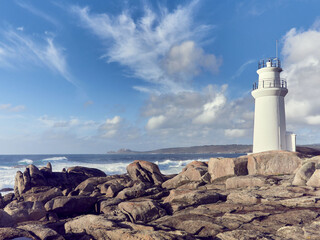 Wall Mural - Lighthouse in the in Muxia Coast, Galicia, Northern Spain. This is one of the last stages in the jacobean way along with the visit to the cape of the Finisterre.