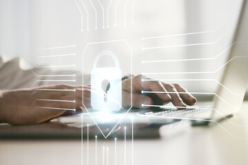 Aufkleber - Creative idea concept with lock symbol and microcircuit illustration and hands typing on laptop on background. Protection and firewall concept. Multiexposure
