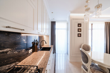 Wall Mural - Modern kitchen interior design with white furniture