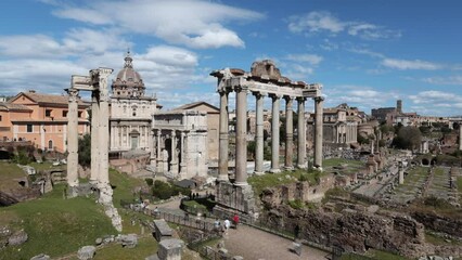 Wall Mural - Time lapse of the Roman Forum in Rome with the crowd of tourists visiting the ruins of the ancient imperial city.