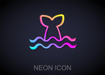 Canvas Print - Glowing neon line Whale tail in ocean wave icon isolated on black background. Vector