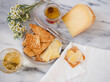 © Michael Marquand - Gourmet cheese with crackers, truffle honey and white wine