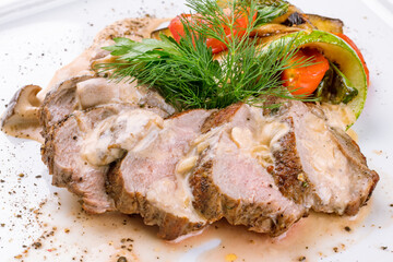 Sticker - Sliced Roast Veal steak with mushroom sauce and grilled vegetables macro close up