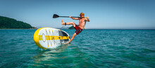 Tanned Sportsman Falling To Sea Water Practicing Supsurfing With Paddle Extreme Sport Leisure
