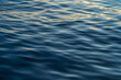 canvas print picture - Sunset water reflect ripples at sun light. Abstract golden reflection on water sunset