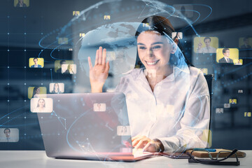 Aufkleber - businesswoman using laptop at desktop with creative glowing blue globe hologram and faces on blurry office interior background. Hire, alumni, online conference and search concept. Double exposure.