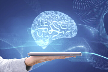 Aufkleber - Close up of casual female hand holding tablet with low polygon brain wireframe mesh on blue background. AI and computing concept.