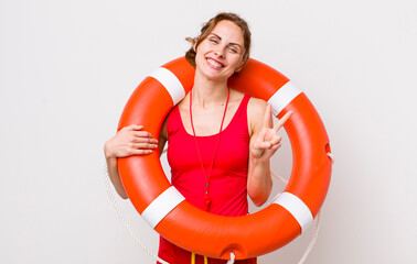 young pretty woman  smiling and looking friendly, showing number two. lifeguard concept