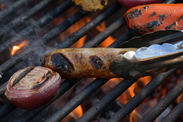  juicy meat sausages fried over an open fire