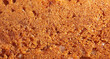 Crust on ruddy cookies as an abstract background.