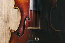 Close View Of A Violin Strings And Bridge