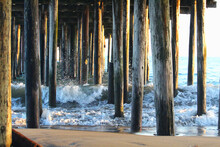 Ocean Waves Under Wooden Pier
