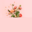Leinwandbild Motiv Top view image of pink flowers composition over pastel background