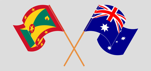 Crossed and waving flags of Grenada and Australia