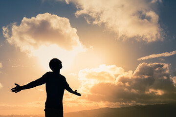 Man on mountain finding will power, and inner strength