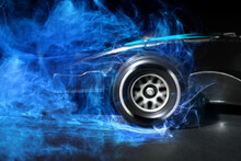 Modern Racing Car With Blue Smoke From Under Wheels On Black Background, Closeup