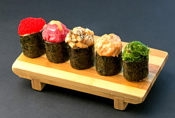 Sticker - sushi roll with eel and shrimp on wooden board