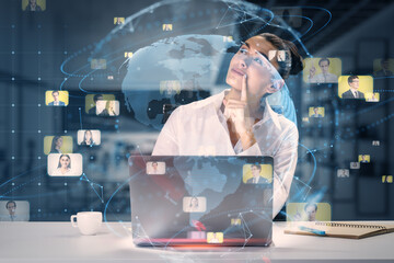 Aufkleber -  businesswoman using laptop at desktop with creative glowing blue globe hologram and faces on blurry office interior background. Hire, alumni, online conference and search concept. Double exposure.