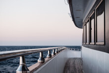 View Along A Yacht Balcony With Deck Toward The Stern Against A Cloudless Sky