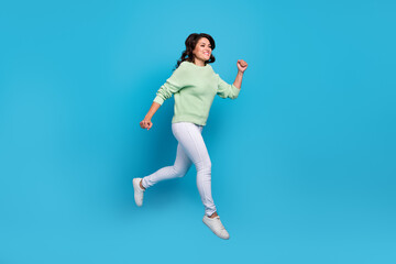 Sticker - Full body photo of cute mature brunette lady run wear shirt pants footwear isolated on blue background