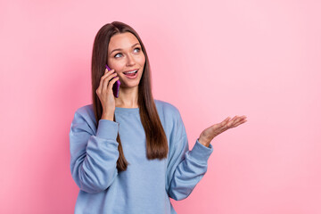 Poster - Portrait of attractive cheerful girl using device talking bla roaming cellular isolated over pink pastel color background