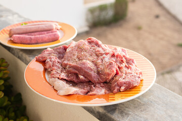 Sticker - raw meat with marinate and herbs on dish