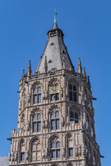 Wall Mural - Architectural details of medieval Cologne Town Hall (Rathaus Koln) - XV century Gothic style tower. Cologne, North Rhine Westphalia, Germany.