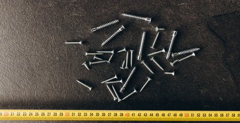 Wall Mural - set of tools on the table, screws with bolts. all for repair.