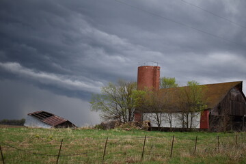 Poster - Barn and Silo Under a Stormy Sky