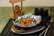 Seafood baked in foil. Asian style dish, Chinese food.