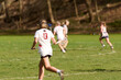© Karina Eremina - SEWICKLEY, PA, USA - APRIL13th 2022: Teenage girls from Sewickley Academy play senior school varsity lacrosse game against Freeport High School. There were lots of goals and action on this sunny day.