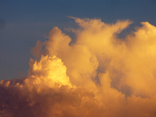 yellow clouds in the blue sky