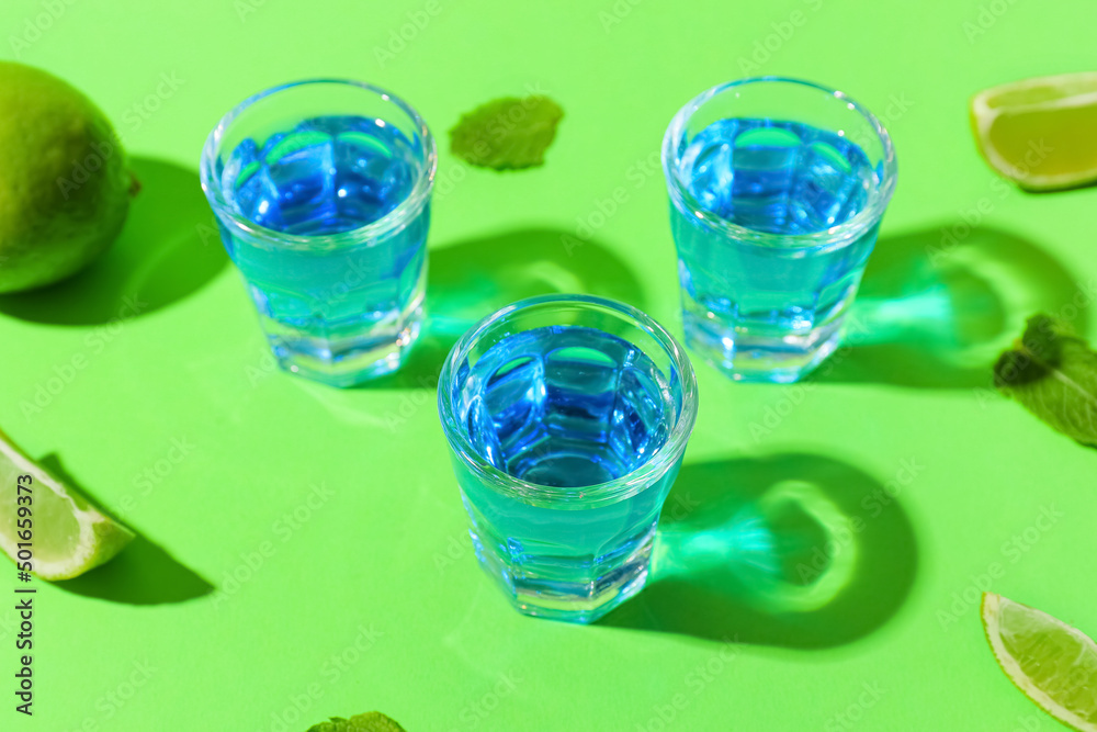 Shot cocktails on color background