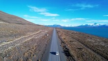 Patagonia Argentina. Famous Road At Town Of El Calafate At Patagonia Argentina. Patagonia Road Landscape. Amazing Landscape Of Desert Scenery With Nevada Mountain. El Calafate At Patagonia Argentina.