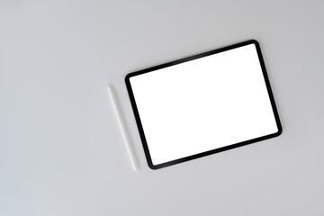 Fototapete - Digital tablet with blank screen and stylus pen on white background. Top view, flat lay, copy space.